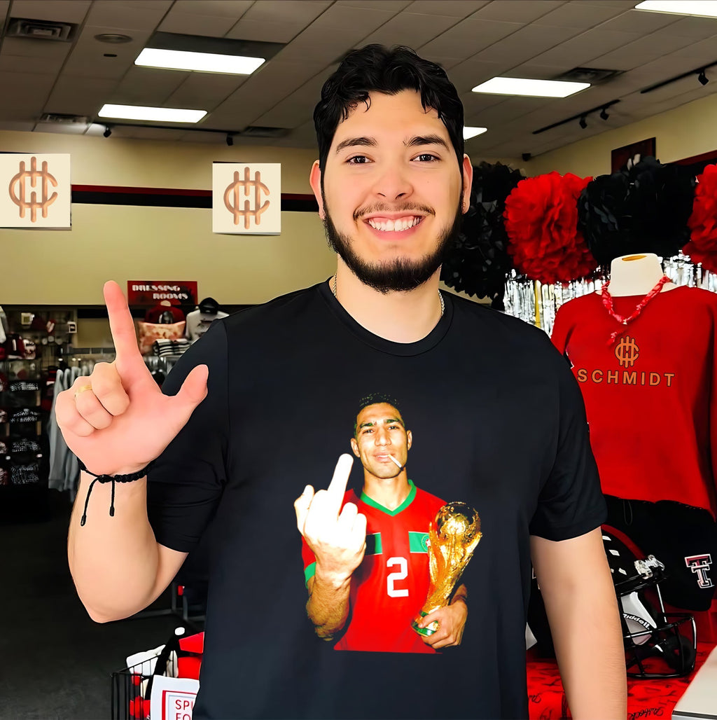 Achraf Hakimi Morocco World Cup middle finger and trophy shirt