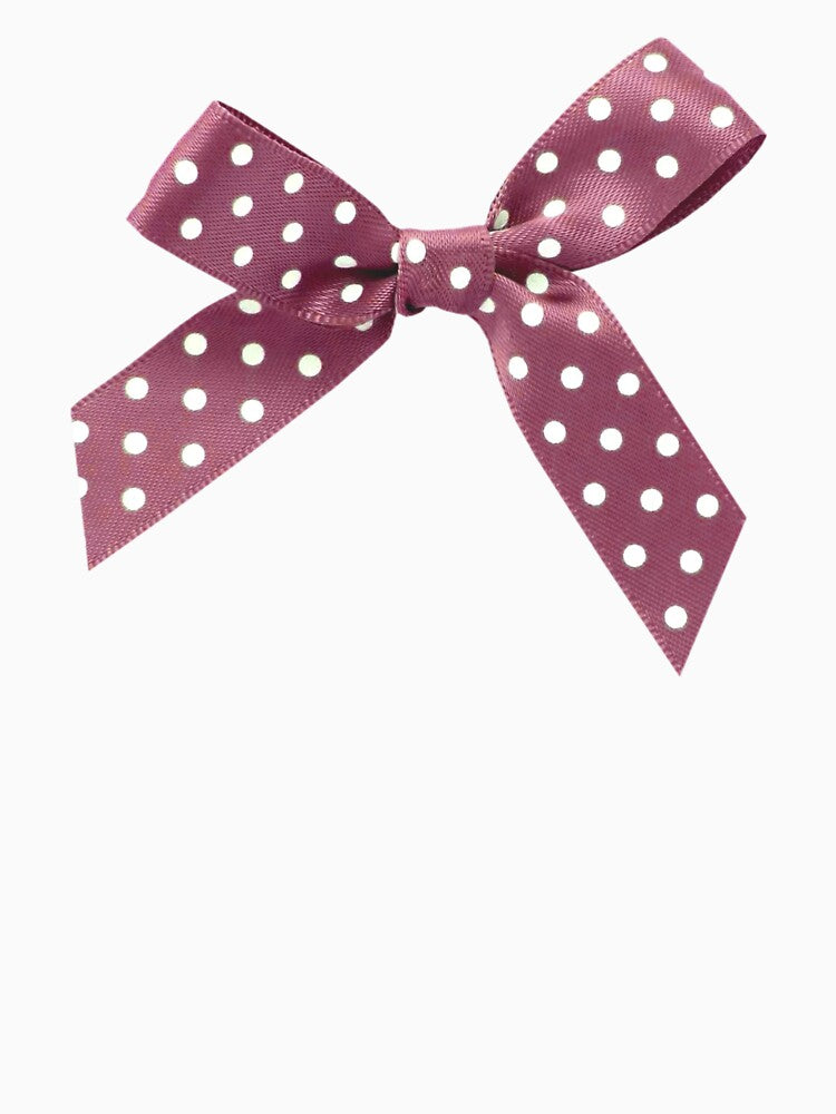 purple polka dot bow by teethfairy