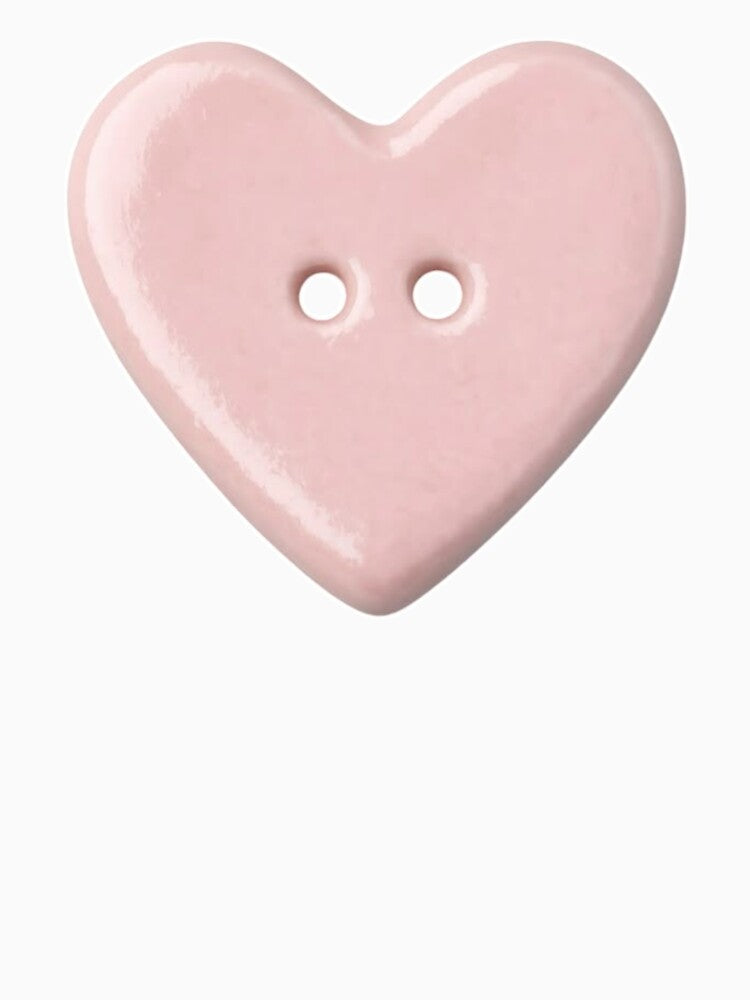 pink heart button by teethfairy