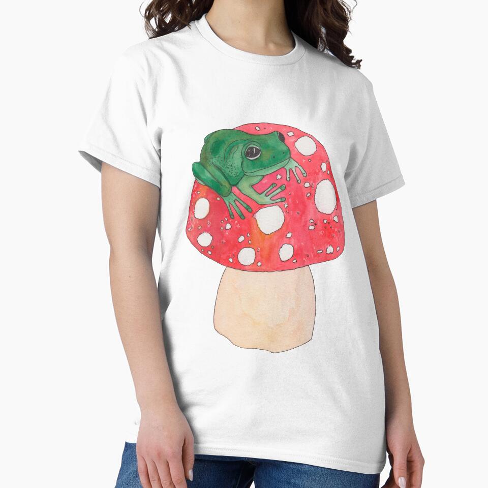Green tropical frog on red mushroom by susserain