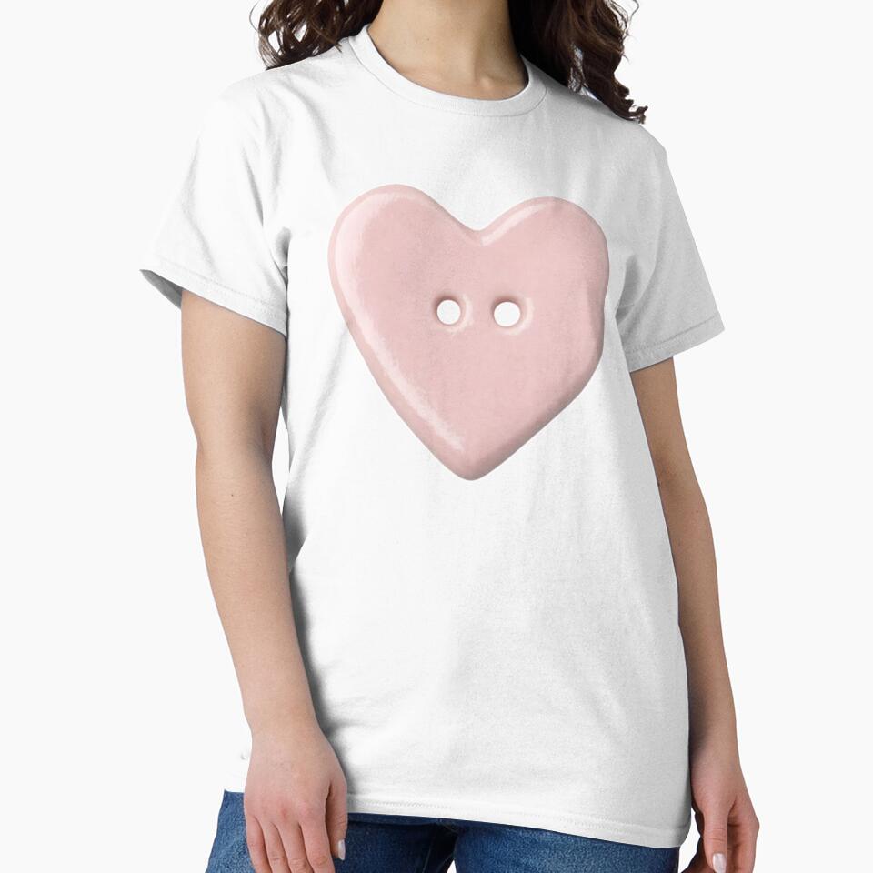 pink heart button by teethfairy