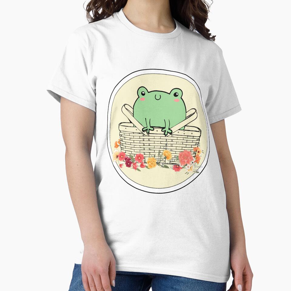 Frog In Picnic Basket With Flowers Round Badge by Pink Ribbon