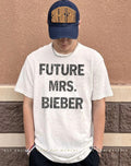 Hailey Bieber wearing Mrs. Bieber shows support for Justin’s Coachella 2026 shirt