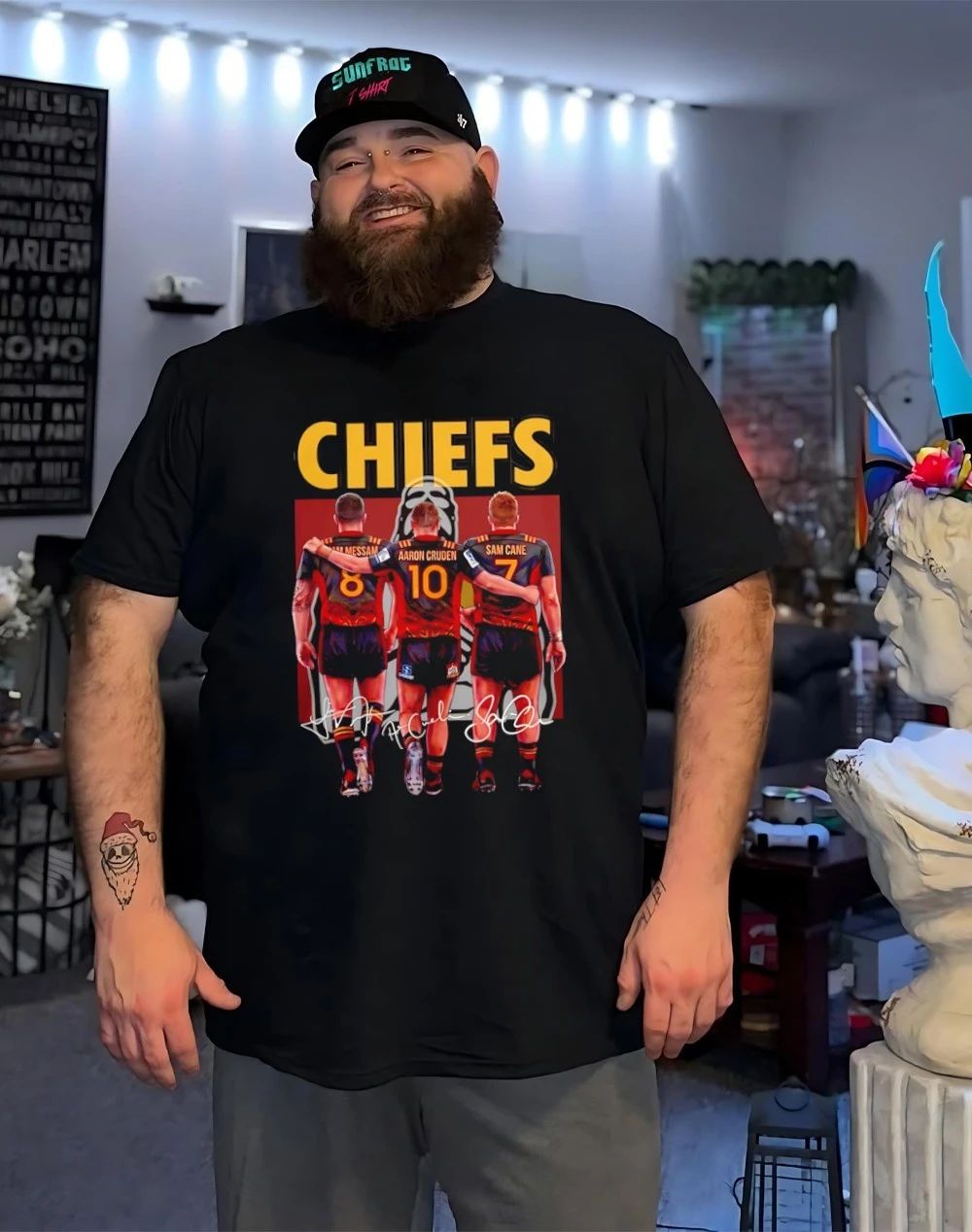 Chiefs Rugby Union players behind signatures shirt